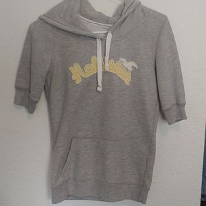 Small Hollister short sleeved gray and yellow hoodie.